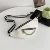 A white bag with a chain on it