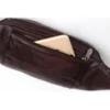 A brown leather bag with two zippers on it