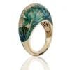 Gold ring with lotus flower enamel