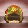 Gold ring with colorful enamel leaf design